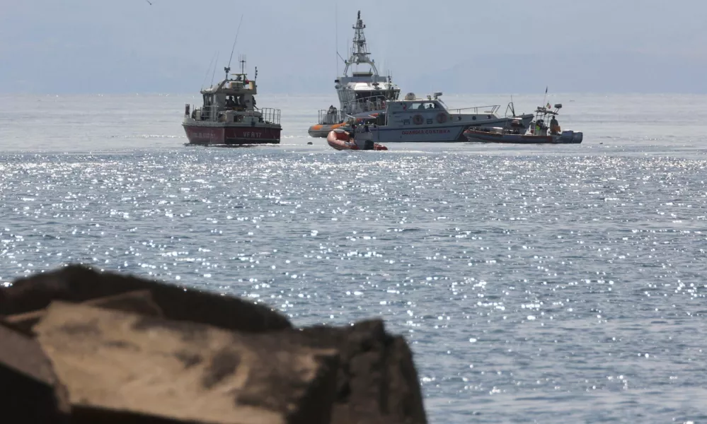 Emergency services work near the scene where a sailboat sank in the early hours of Monday off the coast of Porticello, near the Sicilian city of Palermo, Italy, August 19, 2024. REUTERS/Igor Petyx