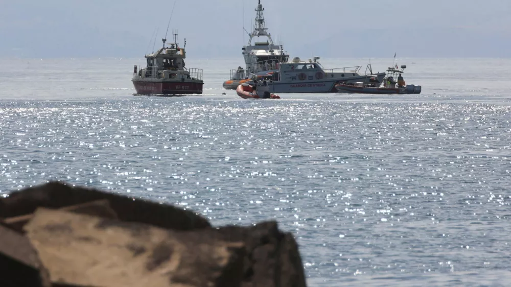 Emergency services work near the scene where a sailboat sank in the early hours of Monday off the coast of Porticello, near the Sicilian city of Palermo, Italy, August 19, 2024. REUTERS/Igor Petyx