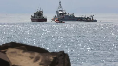 Emergency services work near the scene where a sailboat sank in the early hours of Monday off the coast of Porticello, near the Sicilian city of Palermo, Italy, August 19, 2024. REUTERS/Igor Petyx