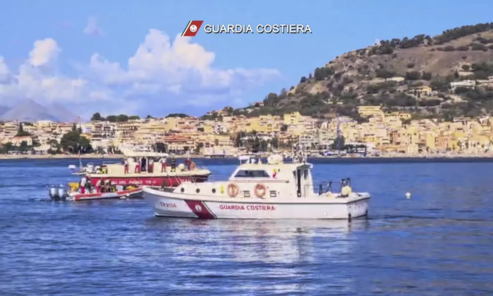 This picture taken from a video released by the Italian Coast Guard on Monday, Aug. 19, 2024, shows the rescue operations in the stretch of Sea near Palermo, Sicily, in southern Italy, where the sailing yacht Bayesian under the UK flag sank early Monday. (Italian Coast Guard via AP, HO)