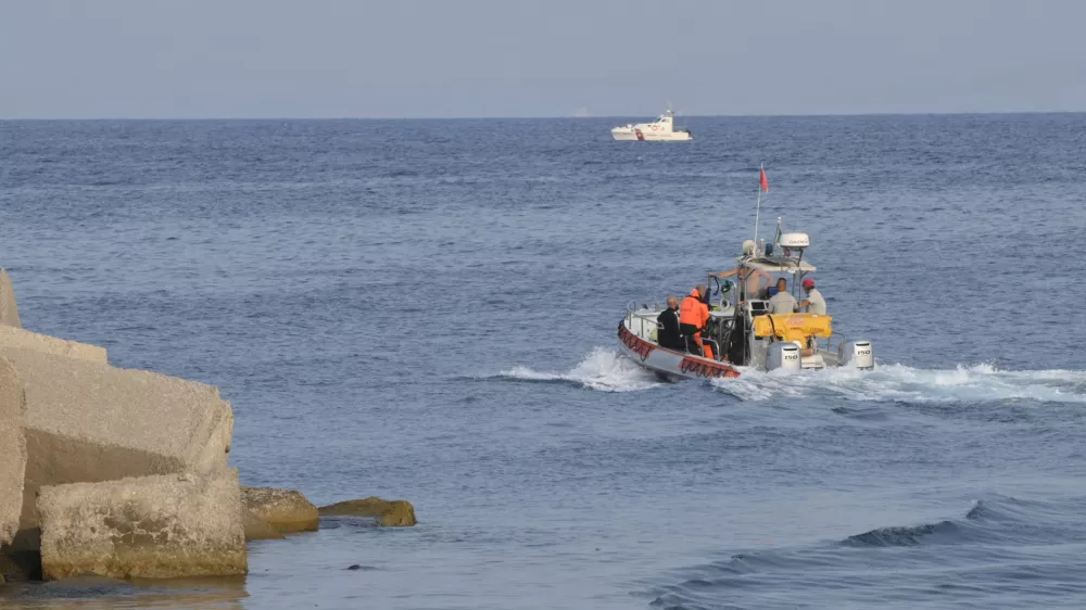 Italian Firefighters scubadivers sails towards the area where the UK flag vessel Bayesan that was hit by a violent sudden storm, sunk early Monday, Aug. 19, 2024, while at anchor off the Sicilian village of Porticello near Palermo, in southern Italy. (AP Photo/Lucio Ganci)