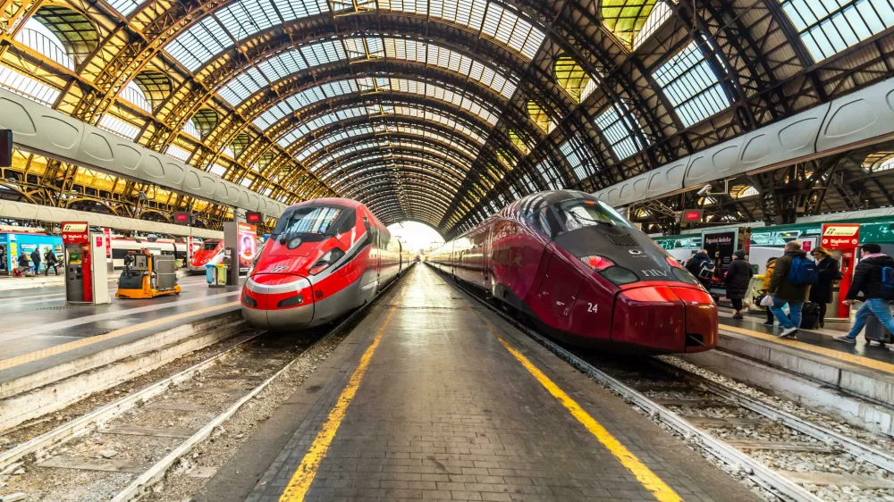 R9214C MILANO, ITALY - DECEMBER 12, 2018: TRENITALIA FRECCIAROSSA and NTV ITALO trains waiting at Milano Centrale station