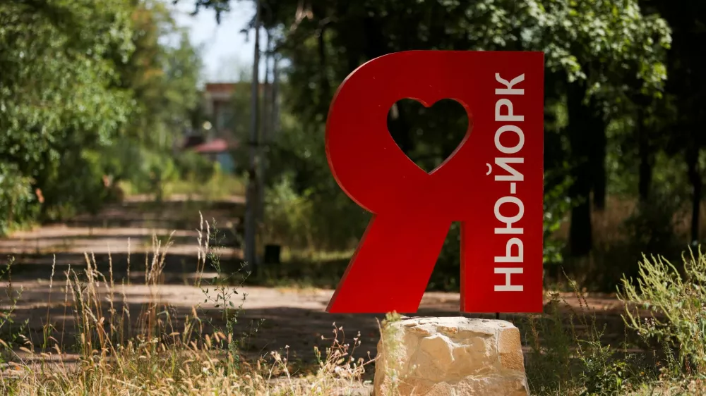 FILE PHOTO: A sign reads "I love Niu York" in Niu-York (New York) near Toretsk, war-affected area in eastern Ukraine as Russia's attack in Ukraine continues, Donetsk region, Ukraine August 25, 2022. REUTERS/Ammar Awad/File Photo