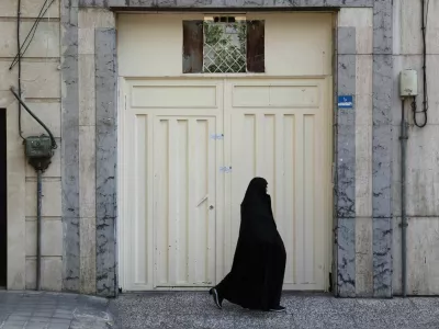 An Iranian woman passes in front of the German Language Institute of Tehran after it was closed by the Iranian police in Tehran, Iran, August 20, 2024. Majid Asgaripour/WANA (West Asia News Agency) via REUTERS ATTENTION EDITORS - THIS PICTURE WAS PROVIDED BY A THIRD PARTY