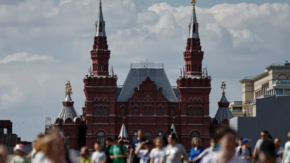 People walk along Red Square near the building of the State Historical Museum in Moscow, Russia, May 18, 2023. REUTERS/Maxim Shemetov