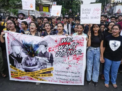 Engineers and engineering students attend a protest against the rape and killing of a trainee doctor at a government hospital, in Kolkata, India, Wednesday, Aug. 21, 2024. India's top court on Tuesday set up a national task force of doctors who will make recommendations on safety of health care workers at their workplace, days after the rape and killing of a trainee doctor that sparked outrage and nationwide protests. (AP Photo/Bikas Das)