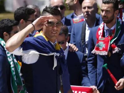 FILE PHOTO: Cristiano Ronaldo and Portugal's winning EURO 2016 team arrive for a reception by the Portuguese president after their return to Lisbon, Portugal, July 11, 2016.  REUTERS/Pedro Nunes/File Photo