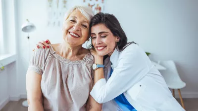 The elderly woman enjoys an embrace from her favorite home healthcare nurse. Medical care, young female doctor hugging patient. Empathy concept. Elderly woman hugging caregiver / Foto: Dragana991