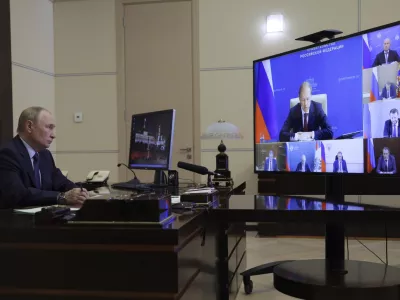 Russian President Vladimir Putin holds a meeting about the situation in border areas of Belgorod, Kursk and Bryansk regions of Russia, at Novo-Ogaryovo state residence outside of Moscow, Russia, Thursday, Aug. 22, 2024. (Gavriil Grigorov, Sputnik, Kremlin Pool Photo via AP)