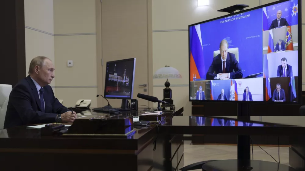 Russian President Vladimir Putin holds a meeting about the situation in border areas of Belgorod, Kursk and Bryansk regions of Russia, at Novo-Ogaryovo state residence outside of Moscow, Russia, Thursday, Aug. 22, 2024. (Gavriil Grigorov, Sputnik, Kremlin Pool Photo via AP)