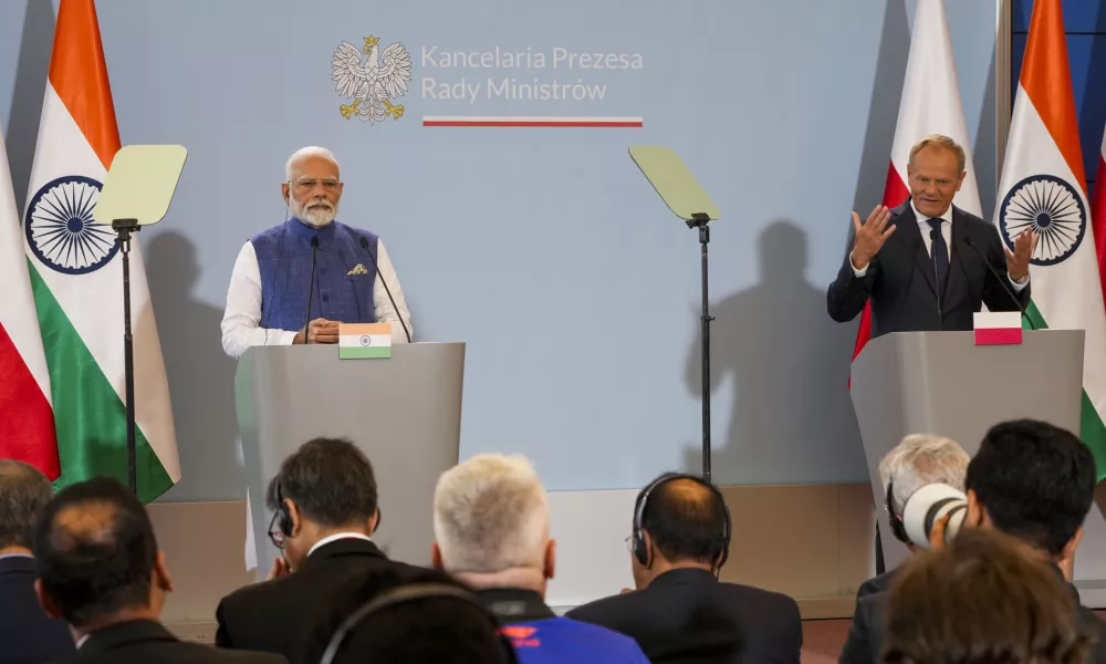 Indian Prime Minister Narendra Modi, left, and his Polish counterpart, Donald Tusk, right, deliver statements to the media following talks in Warsaw, Poland, Thursday, Aug. 22, 2024. AP Photo/Czarek Sokolowski)