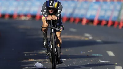 Primoz Roglic, of Slovenia, competes in the first stage of the tour of Spain, La Vuelta, cycling race, an individual time trial with start in Lisbon and finish in Oeiras, Portugal, Saturday, Aug. 17, 2024. (AP Photo/Pedro Rocha)