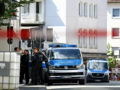 Police officers stand following an incident in which several individuals were killed after a man randomly stabbed passers-by with a knife at a city festival, in Solingen, Germany, August 24, 2024. REUTERS/Thilo Schmuelgen