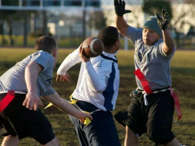 2E8NAC6 Misawa Soldiers Edge Sailors in Annual Flag Football Game