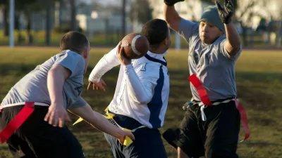 2E8NAC6 Misawa Soldiers Edge Sailors in Annual Flag Football Game