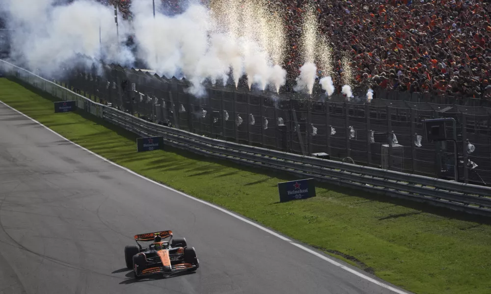 McLaren driver Lando Norris of Britain steers his car to win the Formula One Dutch Grand Prix race at the Zandvoort racetrack, Netherlands, Sunday, Aug. 25, 2024. (AP Photo/Patrick Post, Pool)