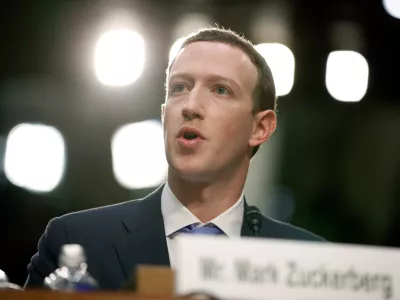 FILE - Facebook CEO Mark Zuckerberg testifies before a joint hearing of the Commerce and Judiciary Committees on Capitol Hill in Washington, April 10, 2018, about the use of Facebook data to target American voters in the 2016 election. Zuckerberg, who was back in damage control mode on Wednesday, Jan. 31, 2024, when he apologized to the parents of children exploited, bullied or driven to self harm via social media, has accumulated a long history of public apologies, often issued in the wake of crisis or when Facebook users rose up against unannounced changes in its service. (AP Photo/Alex Brandon, File)