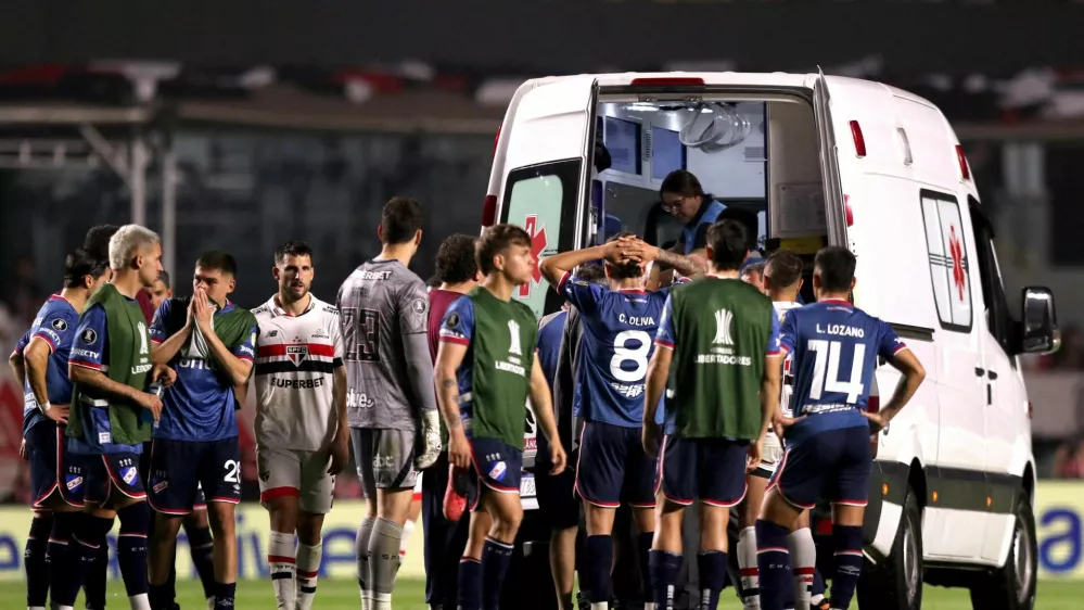 FILE PHOTO: Soccer Football - Copa Libertadores - Round of 16 - Second Leg - Sao Paulo v Nacional - Estadio Morumbi, Sao Paulo, Brazil - August 22, 2024 Nacional's Juan Izquierdo is taken off the pitch after sustaining an injury REUTERS/Carla Carniel/File Photo