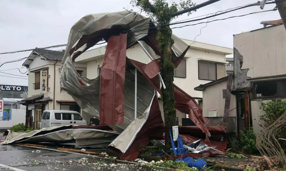 An object blown by strong winds caused by Typhoon Shanshan is stranded on a power line in Miyazaki, southwestern Japan, August 29, 2024, in this photo taken by Kyodo. Mandatory credit Kyodo/via REUTERS ATTENTION EDITORS - THIS IMAGE HAS BEEN SUPPLIED BY A THIRD PARTY. MANDATORY CREDIT. JAPAN OUT. NO COMMERCIAL OR EDITORIAL SALES IN JAPAN.