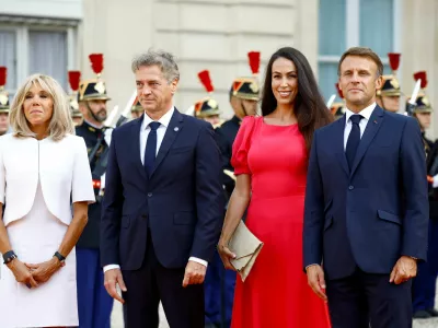 French President Emmanuel Macron and his wife Brigitte Macron welcome Slovenia's Prime Minister Robert Golob and his partner Tina Gaber as they arrive to attend a reception for heads of state and government at the Elysee Palace before the opening ceremony of the Paris 2024 Paralympic Games, in Paris, France August 28, 2024. REUTERS/Sarah Meyssonnier