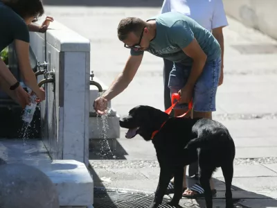 13.08.2024 - vročina - vročinski val - turistična sezona - poletje v Ljubljani - pitnik - osvežitevFOTO: Luka Cjuha