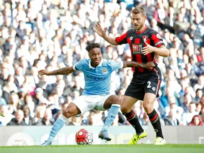 FILE PHOTO: Football - Manchester City v AFC Bournemouth - Barclays Premier League - Etihad Stadium - 17/10/15 Manchester City's Raheem Sterling and Bournemouth's Simon Francis Reuters / Andrew Yates Livepic EDITORIAL USE ONLY. No use with unauthorized audio, video, data, fixture lists, club/league logos or "live" services. Online in-match use limited to 45 images, no video emulation. No use in betting, games or single club/league/player publications. Please contact your account representative for further details./File Photo