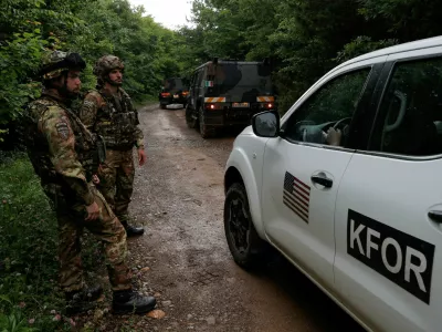 Italian NATO Kosovo Force (KFOR) peacekeepers guard the site near the village of Bare, Kosovo, June 14, 2023. Three Kosovo police officers were detained by Serbian forces on Wednesday but officials from Kosovo and Serbia gave different locations for the arrest, accusing each other of crossing the border illegally. REUTERS/Valdrin Xhemaj NO RESALES. NO ARCHIVES