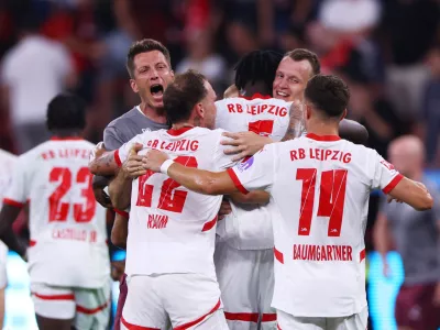 Soccer Football - Bundesliga - Bayer Leverkusen v RB Leipzig - BayArena, Leverkusen, Germany - August 31, 2024 RB Leipzig players celebrate after the match REUTERS/Thilo Schmuelgen DFL REGULATIONS PROHIBIT ANY USE OF PHOTOGRAPHS AS IMAGE SEQUENCES AND/OR QUASI-VIDEO.