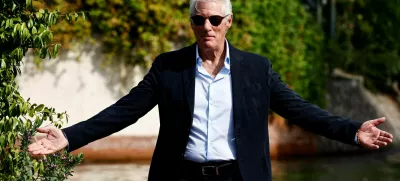 Actor Richard Gere gestures as he arrives during the 81st Venice Film Festival, in Venice, Italy, September 1, 2024. REUTERS/Yara Nardi