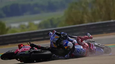 Spain's rider Alex Marquez of the Gresini Racing MotoGP, right and Italian rider Francesco Bagnaia of the Ducati Lenovo Team collide during the MotoGP race at the Aragon Motorcycle Grand Prix at the MotorLand Aragon circuit, in Alcaniz, Spain, Sunday, Sept. 1, 2024. (AP Photo/Jose Breton)