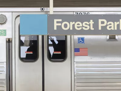 Police investigators work inside a CTA Blue Line train parked at the Forest Park station after a shooting, Monday, Sept. 2, 2024, in Forest Park, Ill. (John J. Kim/Chicago Tribune via AP)