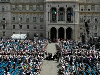 Pope Francis leaves after attending a mass at Piazza Unita d'Italia in Trieste, Italy, July 7, 2024. REUTERS/Alessandro Garofalo