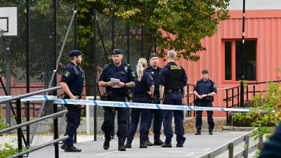 Police officers work following a shooting incident in Trangsund, Huddinge, Sweden September 4, 2024. TT News Agency/Jonas Ekstromer/via REUTERS   ATTENTION EDITORS - THIS IMAGE WAS PROVIDED BY A THIRD PARTY. SWEDEN OUT. NO COMMERCIAL OR EDITORIAL SALES IN SWEDEN.