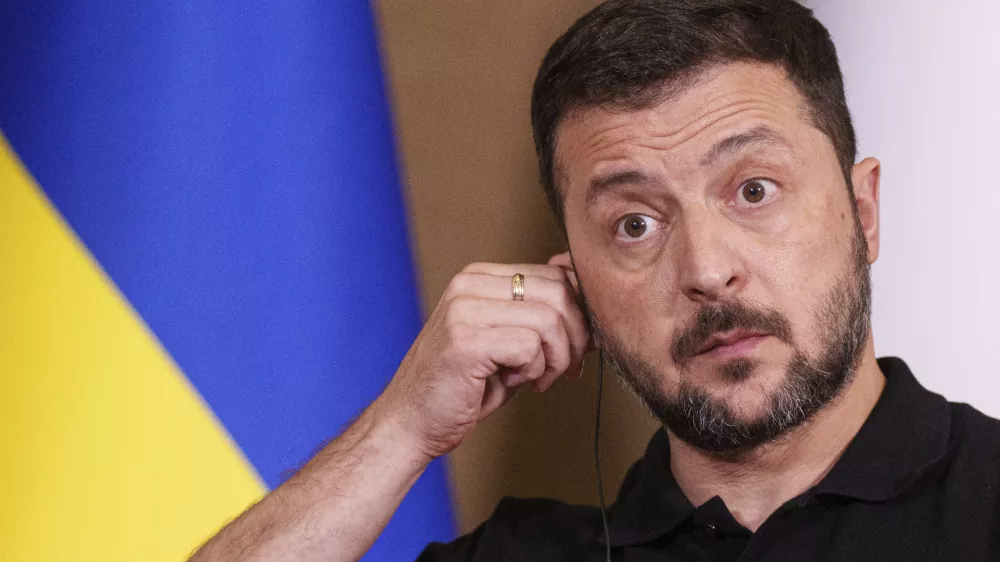 Ukrainian President Volodymyr Zelenskyy speaks during a joint press conference with Netherlands' Prime Minister Dick Schoof in Zaporizhzhia, Ukraine, Monday Sept. 2, 2024. (AP Photo/Evgeniy Maloletka)