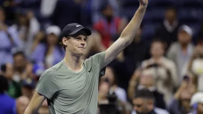 Jannik Sinner, of Italy, acknowledges the crowd after defeating Daniil Medvedev, of Russia, during the quarterfinals of the U.S. Open tennis championships, Wednesday, Sept. 4, 2024, in New York. (AP Photo/Adam Hunger)