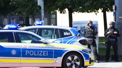 Police officer block a street after police fired shots at a suspicious person near the Israeli Consulate and a museum on the city's Nazi-era history in Munich, Germany, Thursday, Sept. 5, 2024. (AP Photo/Matthias Schrader)