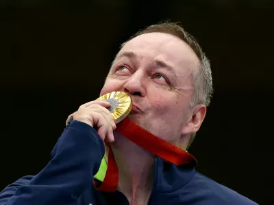 Paris 2024 Paralympics - Shooting - R4 - Mixed 10m Air Rifle Standing SH2 Final - Chateauroux Shooting Centre, Deols, France - August 30, 2024 Gold medallist Francek Gorazd Tirsek of Slovenia celebrates after the final REUTERS/Eng Chin An