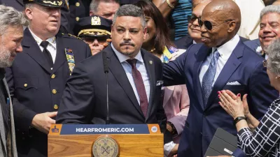 FILE - Edward A. Caban, center, speaks after being sworn in as NYPD police commissioner outside New York City Police Department 40th Precinct on Monday, July 17, 2023, in New York. Mayor Eric Adams on the right. (AP Photo/Jeenah Moon, File)