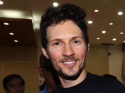 FILE - Telegram co-founder Pavel Durov smiles following his meeting with Indonesian Communication and Information Minister Rudiantara in Jakarta, Indonesia, on Aug. 1, 2017. (AP Photo/Tatan Syuflana, File)