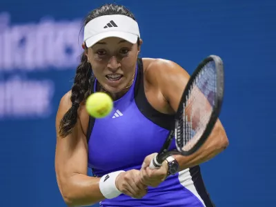 Jessica Pegula, of the United States, returns a shot to Karolina Muchova, of the Czech Republic, during the women's singles semifinals of the U.S. Open tennis championships, Thursday, Sept. 5, 2024, in New York. (AP Photo/Julia Nikhinson)