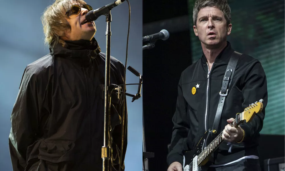 Liam Gallagher performs at the Reading Music Festival, England on Aug. 29, 2021, left, and Noel Gallagher performs at the Glastonbury Festival in Worthy Farm, Somerset, England, on June 25, 2022. (AP Photo)