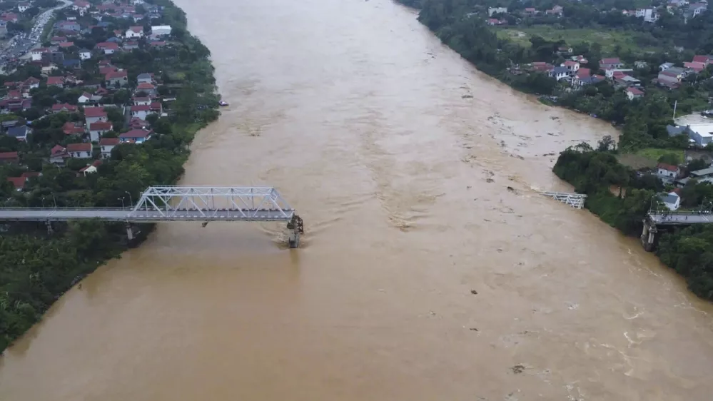 A bridge collapse due to floods triggered by typhoon Yagi in Phu Tho province, Vietnam on Monday, Sept. 9, 2024 (Bui Van Lanh/ VNA via AP)