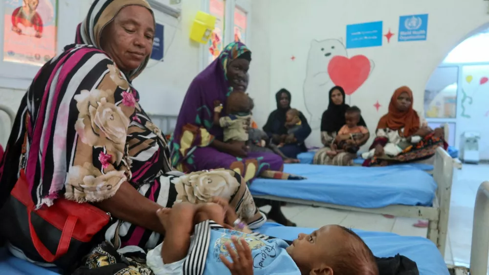 Children, suffering from malnutrition, are treated at Port Sudan Paediatric Centre, during a visit by WHO Director-General Tedros Adhanom Ghebreyesus to the country, in Sudan, September 7, 2024. REUTERS/El Tayeb Siddig   TPX IMAGES OF THE DAY