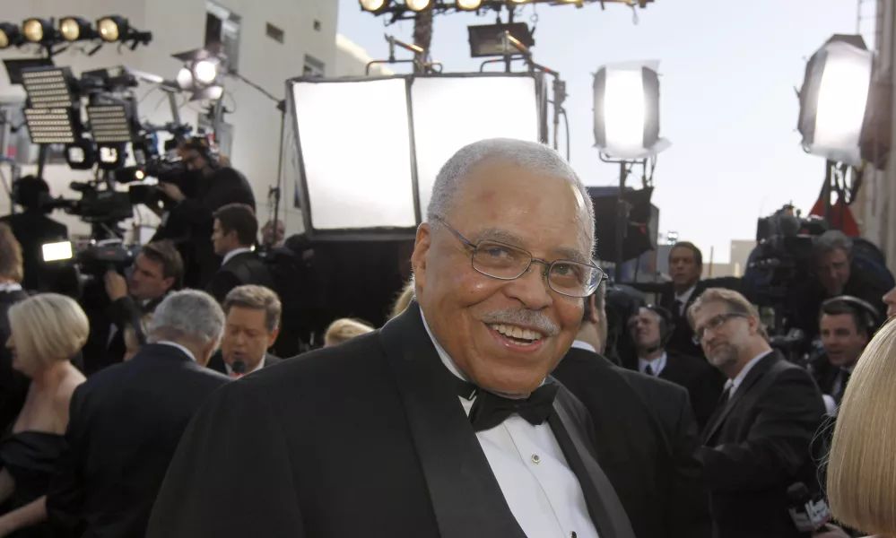 FILE - James Earl Jones arrives before the 84th Academy Awards on Sunday, Feb. 26, 2012, in the Hollywood section of Los Angeles. Jones, who overcame racial prejudice and a severe stutter to become a celebrated icon of stage and screen has died at age 93. His agent, Barry McPherson, confirmed Jones died Monday morning, Sept. 9, 2024, at home. (AP Photo/Chris Carlson, File)