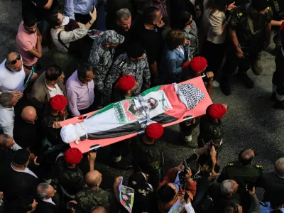 09 September 2024, Palestinian Territories, Nablus: Members of Palestinian security forces carry the body of slain Turkish-American International Solidarity Movement activist Aysenur Ezgi Eygi during a funeral procession in Nablus in the Israeli occupied West Bank. The family of the activist who was fatally shot on September 6 during a protest against Israeli settlements in Beita, in the occupied West Bank, has called for an independent investigation into her death. They accuse the Israeli military of "violently" killing her and are seeking accountability for the incident. Photo: Nasser Ishtayeh/SOPA Images via ZUMA Press Wire/dpa