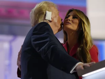 Republican presidential candidate former President Donald Trump, greets his wife, Melania Trump on stage during the Republican National Convention, Thursday, July 18, 2024, in Milwaukee. (AP Photo/Julia Nikhinson)