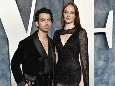 FILE - Joe Jonas, left, and Sophie Turner appear at the Vanity Fair Oscar Party on March 12, 2023, in Beverly Hills, Calif. (Photo by Evan Agostini/Invision/AP, File)