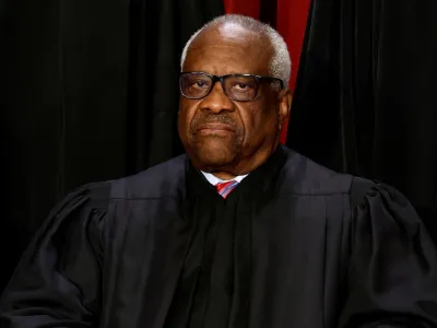 FILE PHOTO: U.S. Supreme Court Associate Justice Clarence Thomas poses during a group portrait at the Supreme Court in Washington, U.S., October 7, 2022. REUTERS/Evelyn Hockstein/File Photo