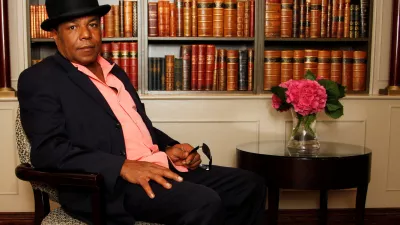 FILE PHOTO: Tito Jackson, brother of singer Michael Jackson who died after an overdose in August, poses for pictures at the Churchill Hyatt Regency Hotel in London, Britain, September 17, 2009. REUTERS/Luke MacGregor/File Photo