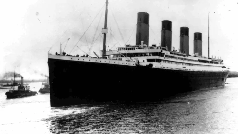 In this April 10, 1912, file photo, the liner Titanic leaves Southampton, England on her maiden voyage. Nearly 100 years after the Titanic went down, a cruise with the same number of passengers aboard is setting sail to retrace the ship's voyage, including a visit to the location where it sank. The Titanic Memorial Cruise is set to depart Sunday, April 8, 2012, from Southampton, where the Titanic left on its maiden voyage. (AP Photo/File)